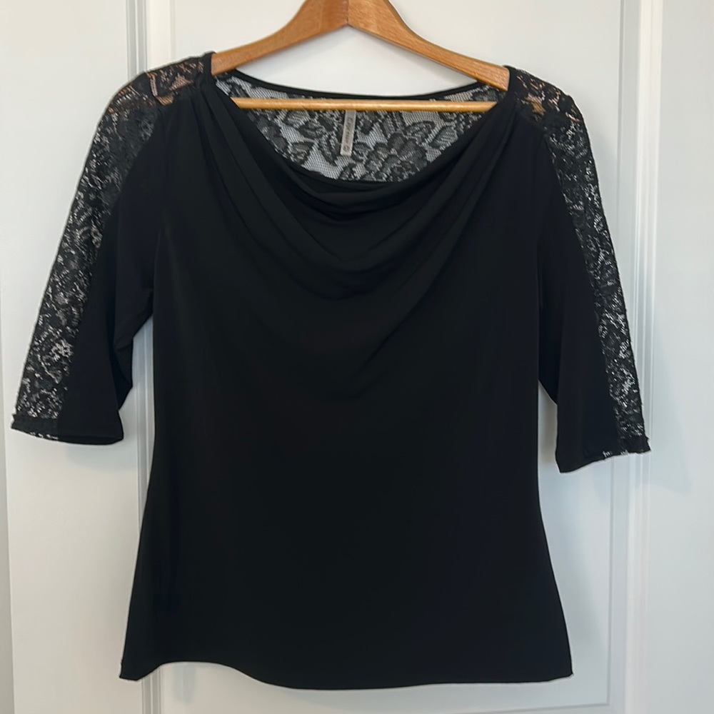 Black blouse with dip neck and pretty lace detail